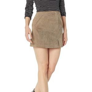 New with tags tan skirt with small slit